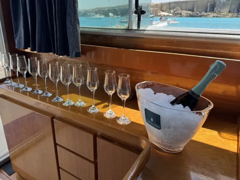 Glasses and bubbly on ice at Bamby's bar, Favignana through the window