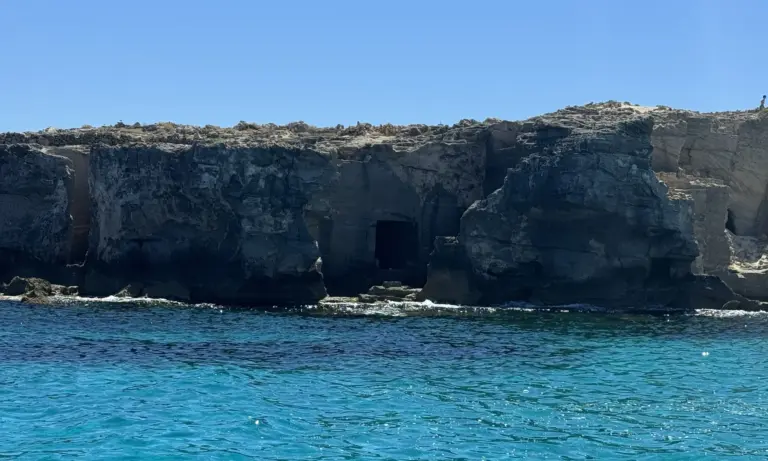 Favignana's tuff quarries seen from the sea